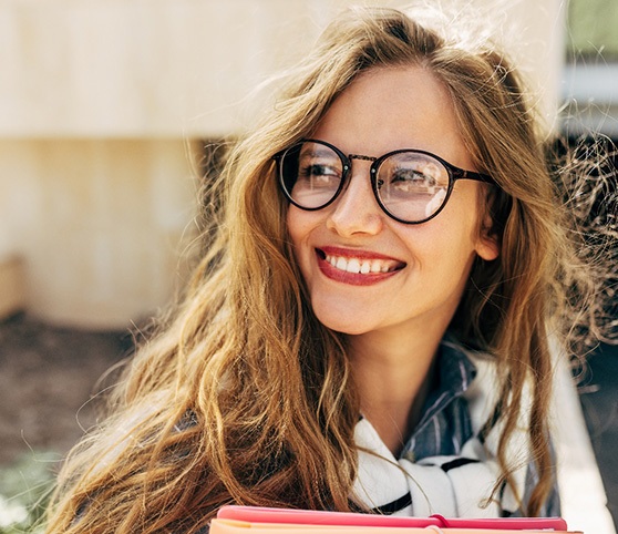 Woman smiling outside